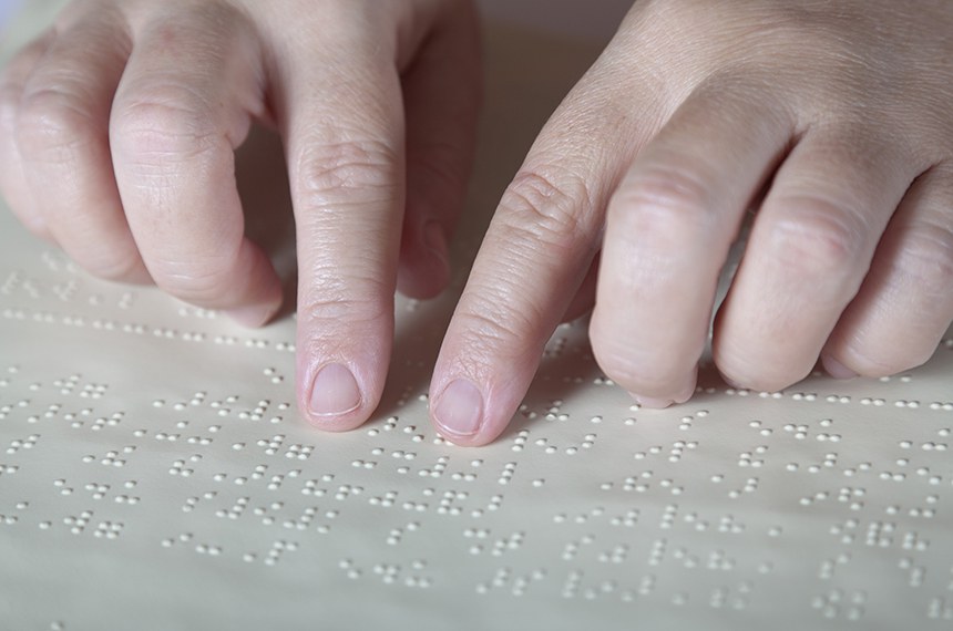 Blind Reading Text In Braille Language