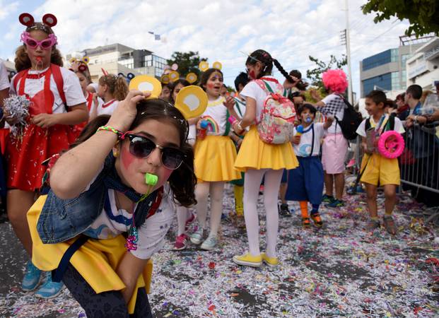 Limassol, Cyprus - March 13, 2016: Happy people in teams dressed with colorfull costumes at famous Limassol Carnival Parade on March 13 2016 , Cyprus.