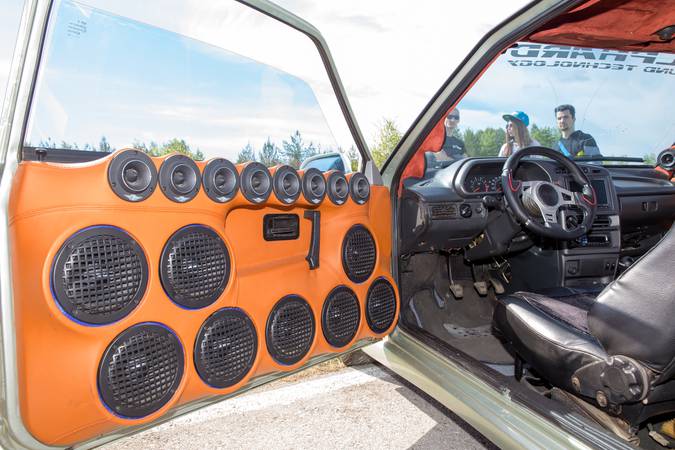 Perm, Russia - June 7, 2014: Many built-in door car music speakers at Avto - moto festival "Resox Tuning Fest 3".