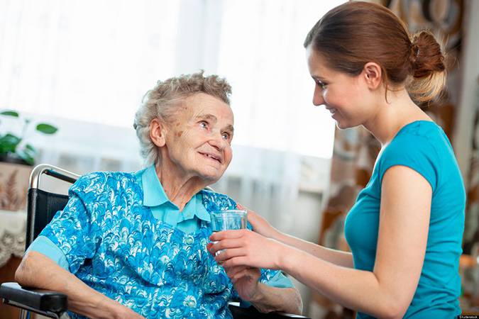 Senior woman with her caregiver at home; Shutterstock ID 110115194; PO: The Huffington Post; Job: The Huffington Post; Client: The Huffington Post; Other: The Huffington Post