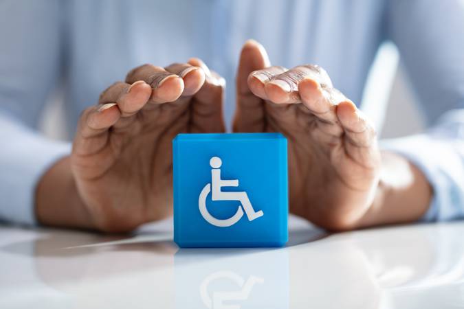 Human Protecting Cubic Block With Disabled Handicap Icon