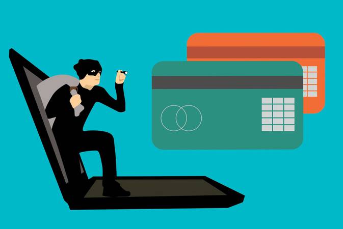Arte sobre fraude eletrônica. Um homem vestido de ladrão saindo de dentro da tela do notebook para olhar cartões de crédito.